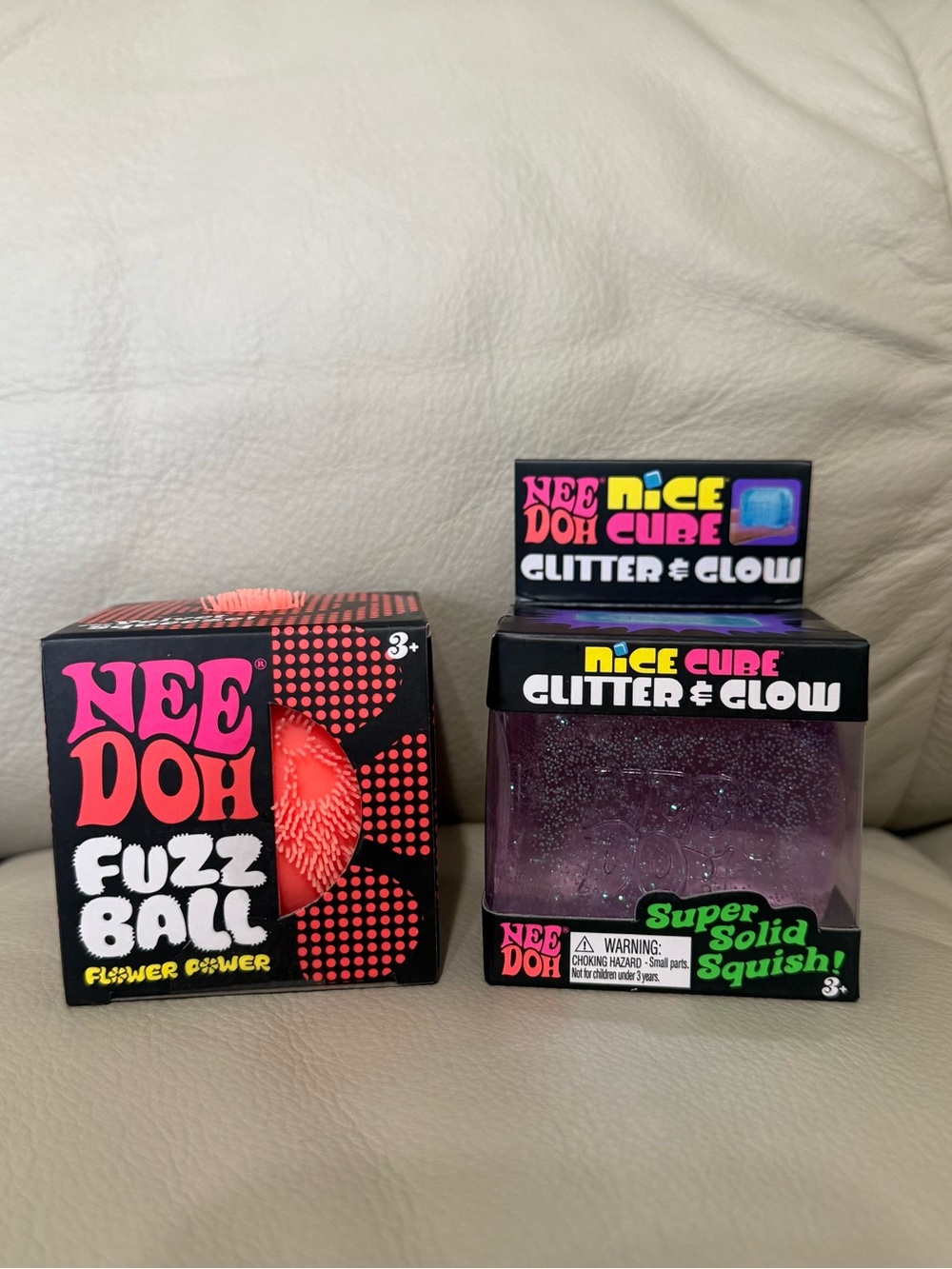 Needoh Purple Glitter & Glow Nice Cube + Orange Flower Power Fuzz Ball Squishy